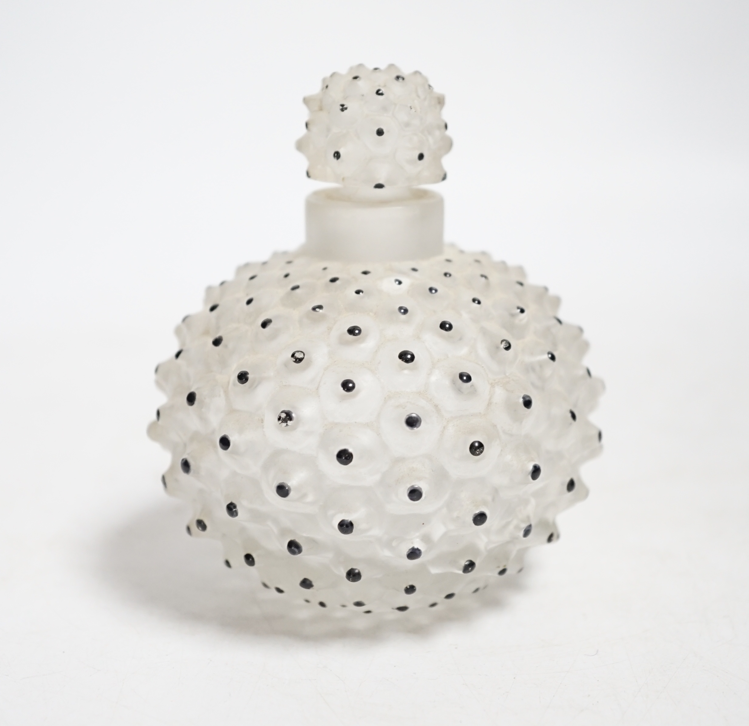 A Lalique Cactus glass scent bottle and stopper, stamped Lalique, France on base, 9cm high